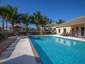 Resort style pool and lounge chairs